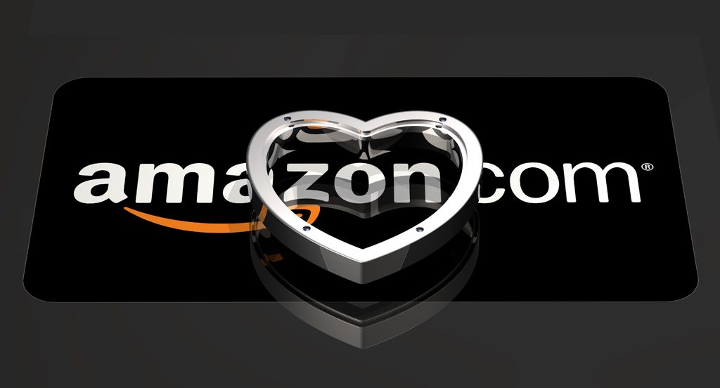 3d illustration of a large chrome heart over top of a reflective black Amazon logo
